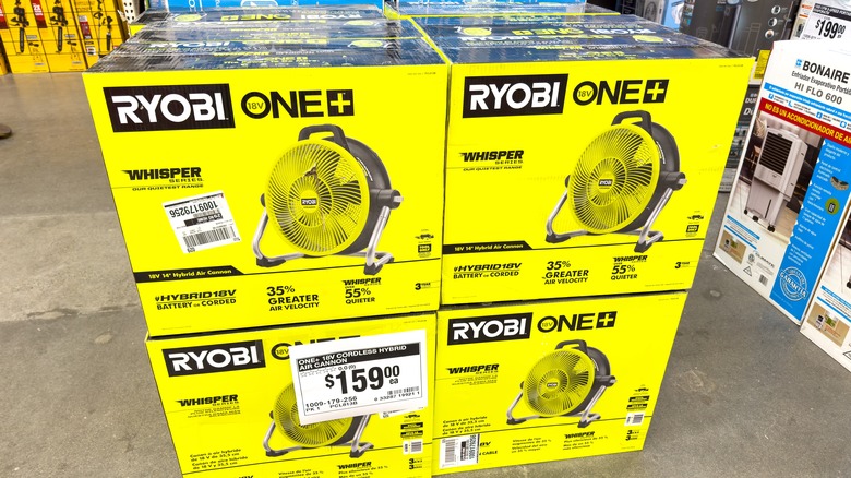Ryobi fans stacked on store floor