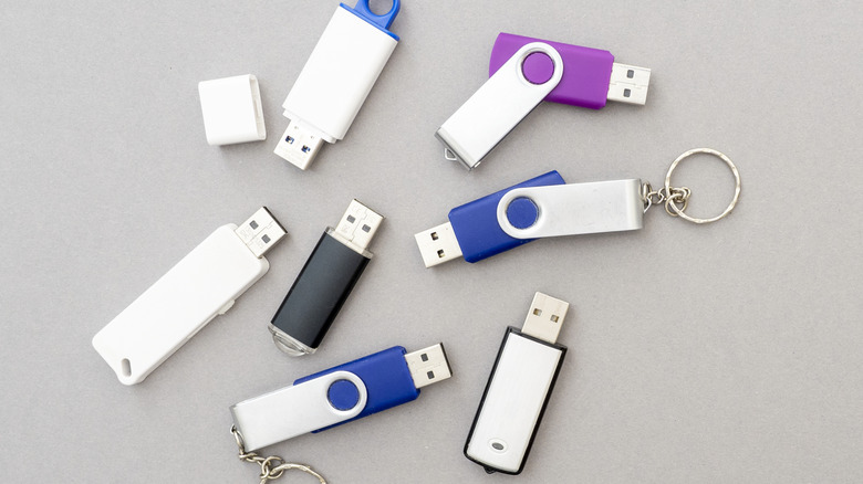 An assortment of old USB flash drives