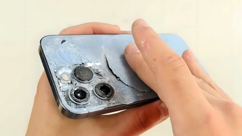 Smashed cameras on smartphone