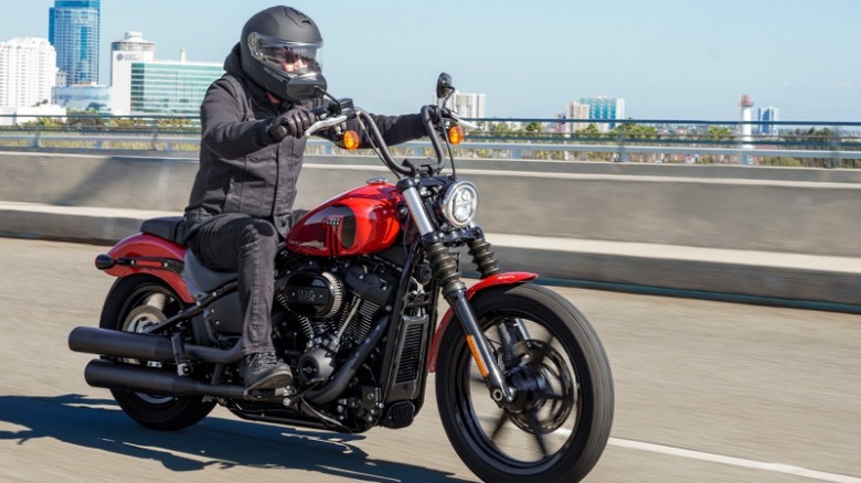 Person riding Harley-Davidson street bike