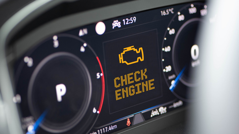 A "check engine" warning light on a car's dashboard.