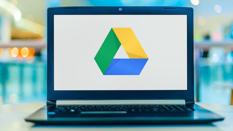 Google Drive mascot on a laptop screen