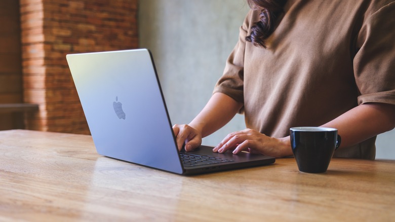 Woman using MacBook 