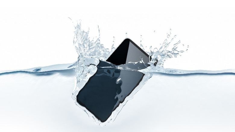 Phone dropping into water