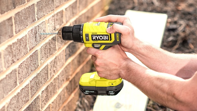 Ryobi tool drilling brick