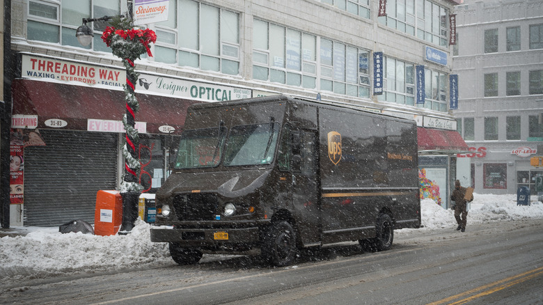 UPS truck parked in snow