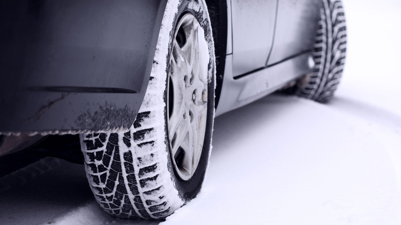 Car tire in the snow