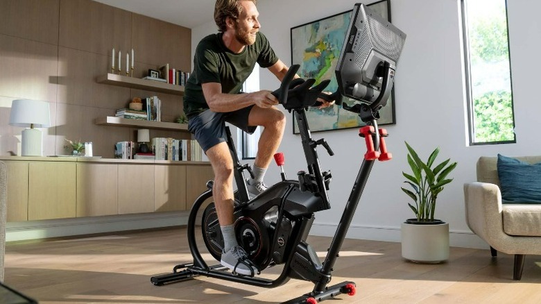 Man on Bowflex exercise bike