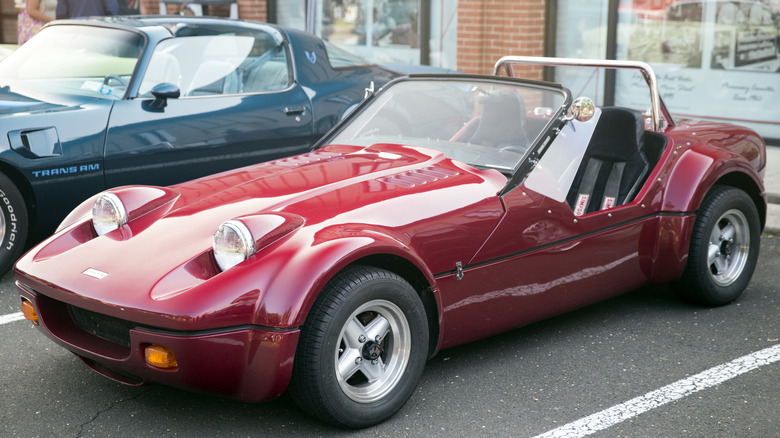 Red maxton rollerskate parked in parking lot