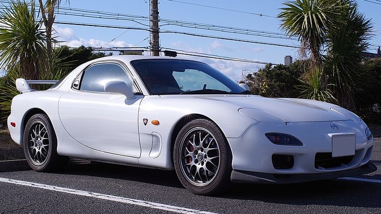 White 2002 Mazda RX-7 in parking lot