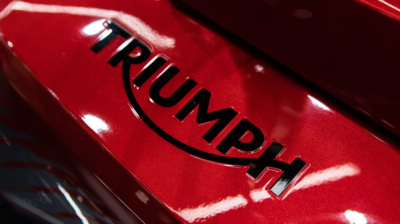 Triumph badge on motorcycle closeup