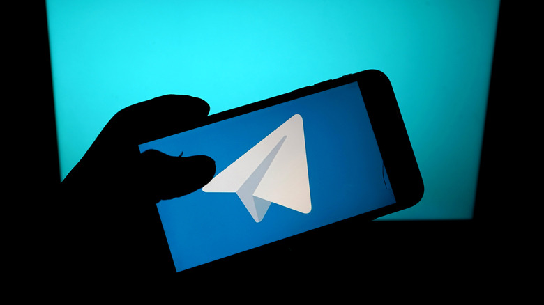 Telegram app logo on smartphone