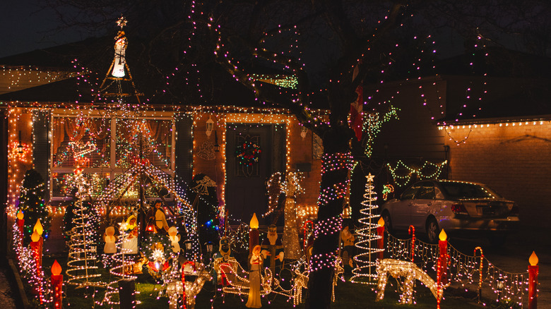 Christmas lights set up in front of a house