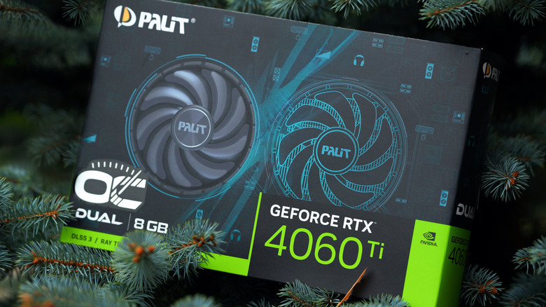 Palit Geforce RTX 4060 TI graphics card box set against evergreen branches