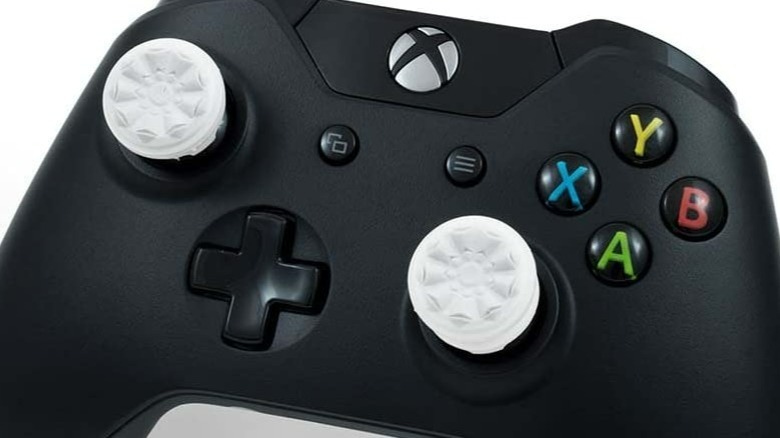 Xbox One controller with thumbstick covers