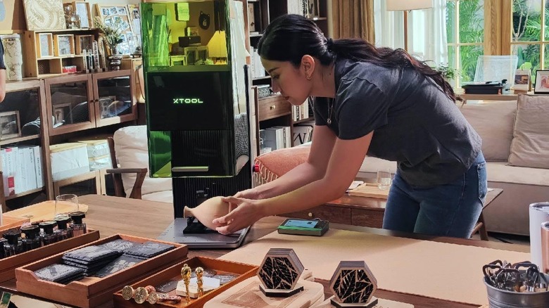 Woman working with xTool F1 Ultra