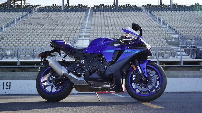 Yamaha YZF-R1 profile with Sonoma Raceway stands in the background