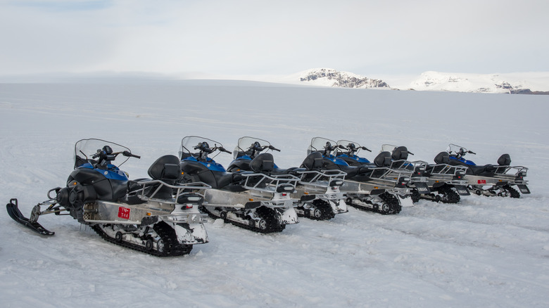 Yamaha snowmobiles lined up in Vatnajokull, Iceland