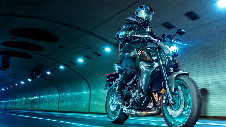 Yamaha MT motorcycle driving through a tunnel with a blue hue