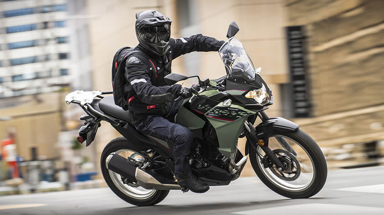 man riding a Kawasaki 