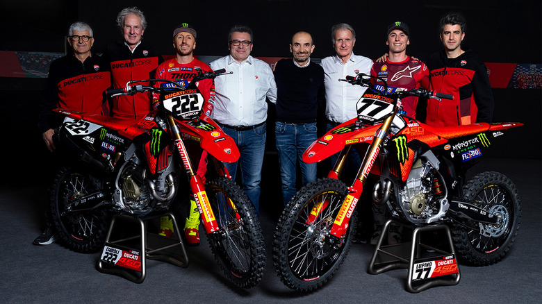 people standing with desmo450 mx