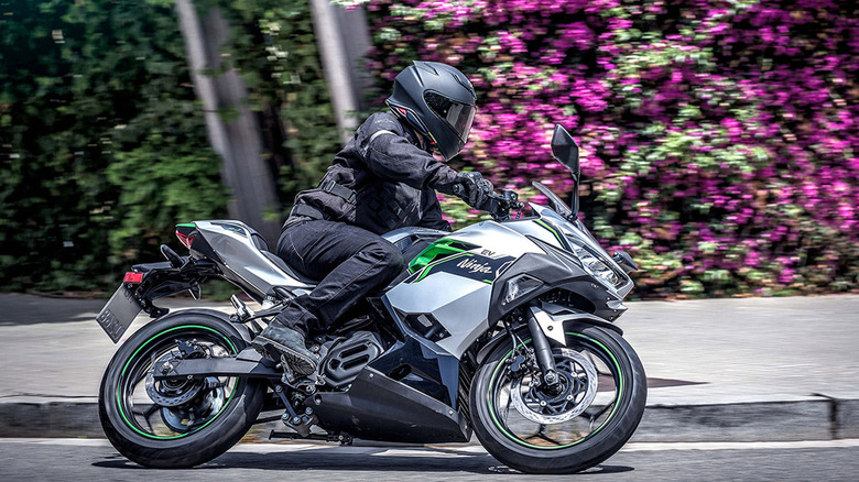 person riding kawasaki ninja e-1