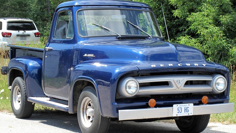 A Superior Blue 1953 Mercury M-100 pickup truck.