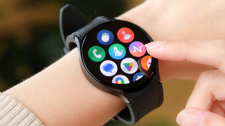 Woman using Samsung Galaxy watch