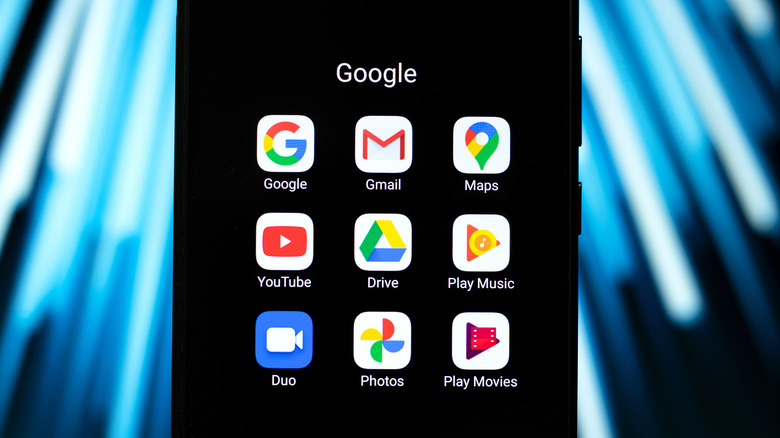 Google apps on a phone with a dark background.