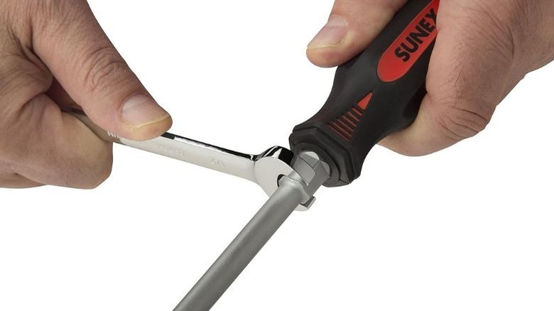 Bolster screwdriver used with wrench