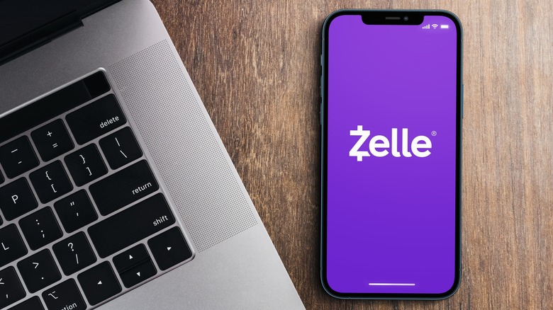 Zelle logo smartphone on desk