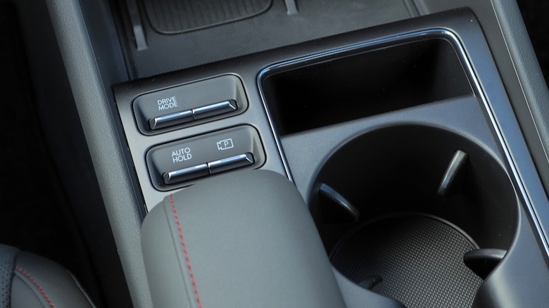 Cupholders and drive mode controls