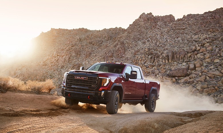 2024 GMC Sierra HD ATX4 kicking up dust on the trail