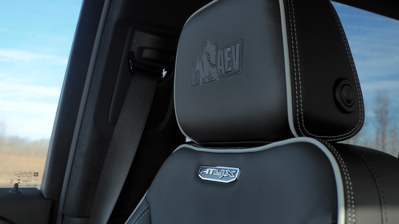 Seat with AT4X and AEV logos