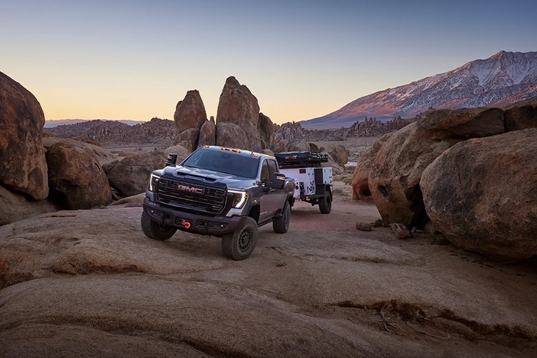 2024 GMC Sierra HD AT4X AEV Extreme Edition pulling a trailer