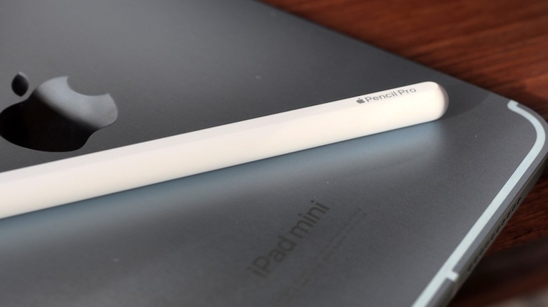 Apple Pencil Pro on top of iPad mini